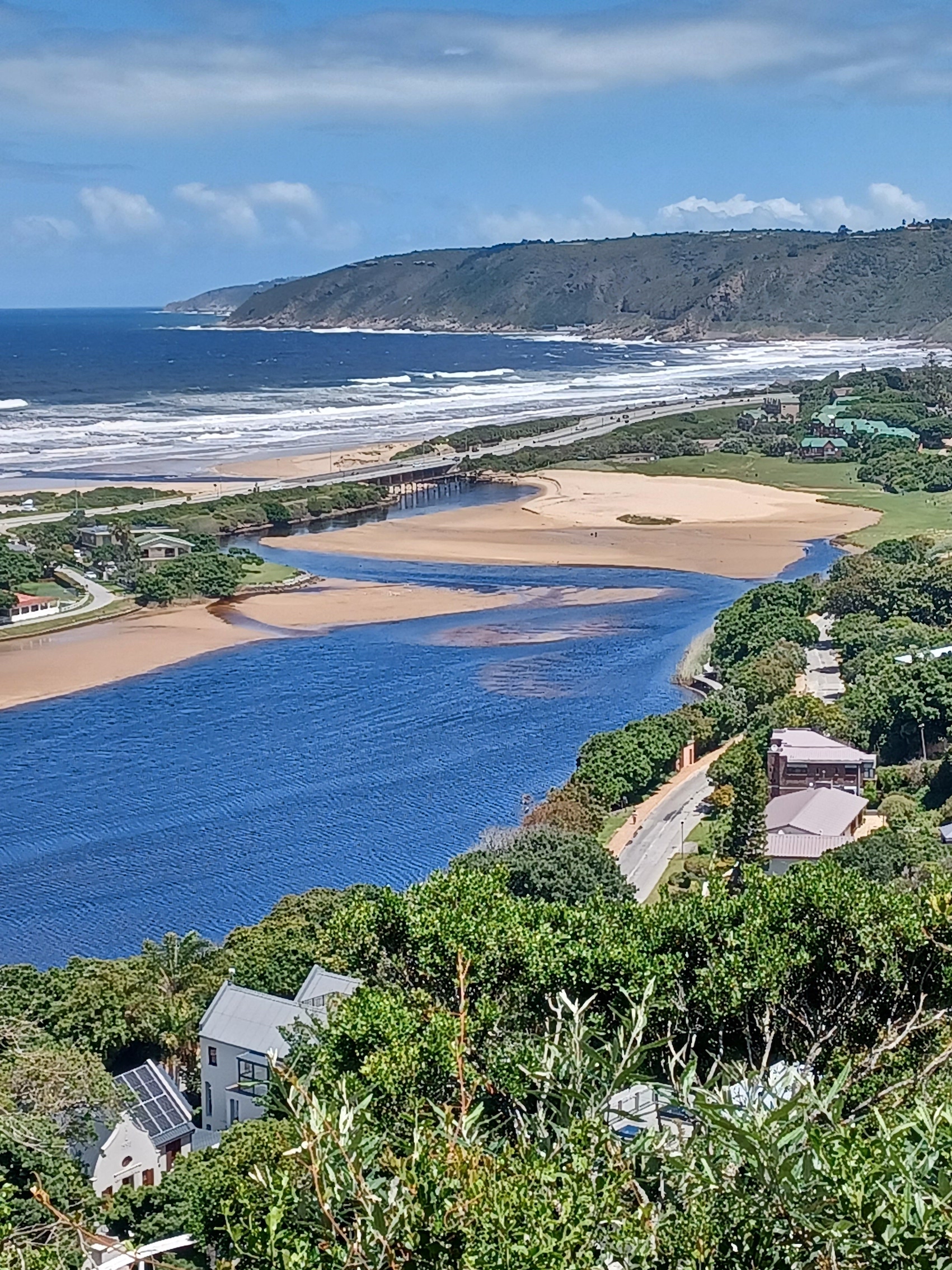 Aerial view of the Wilderness river mouth meeting the sea