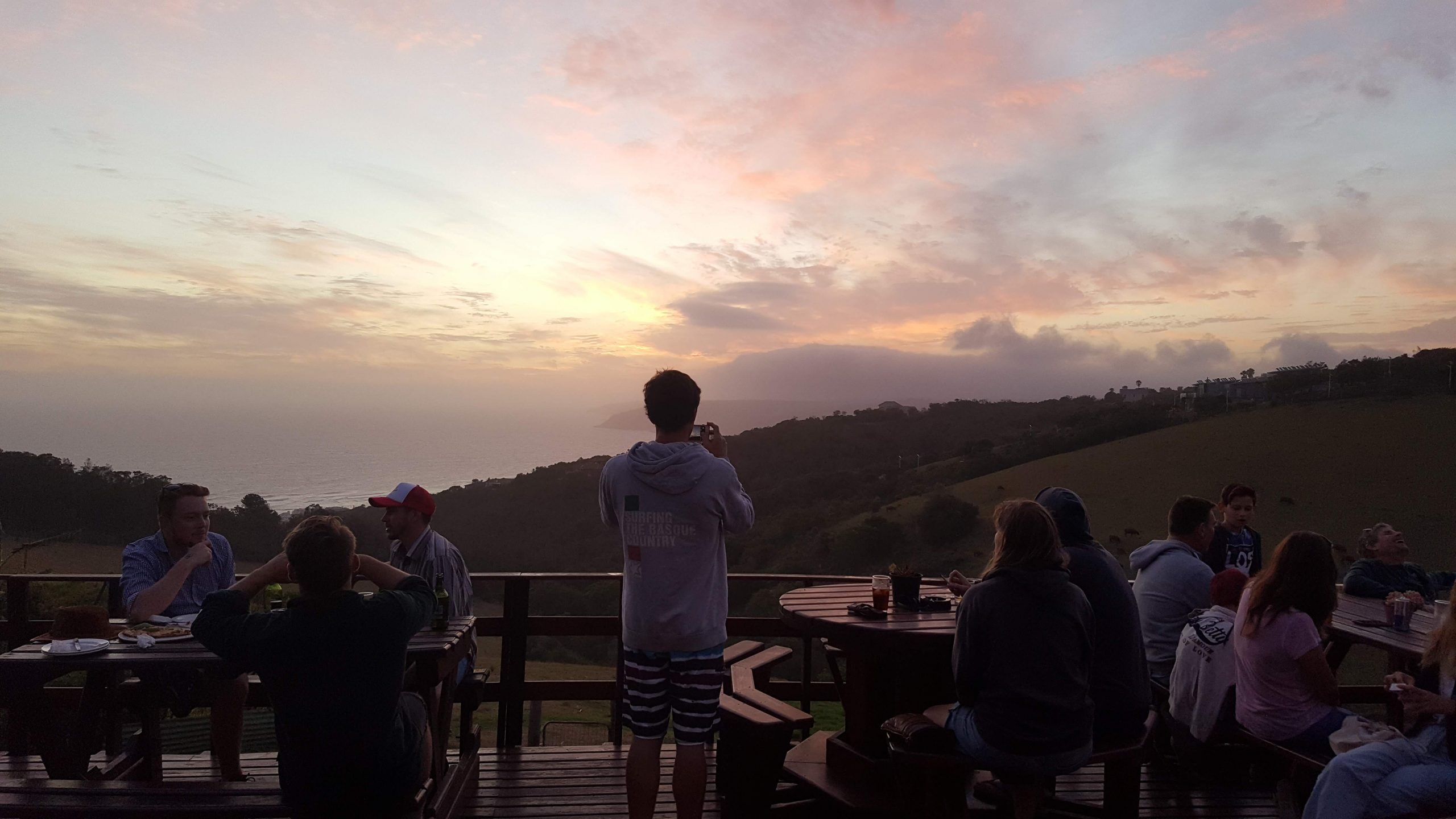 The deck at Wildfarm looking out over the Wilderness hills at sunset